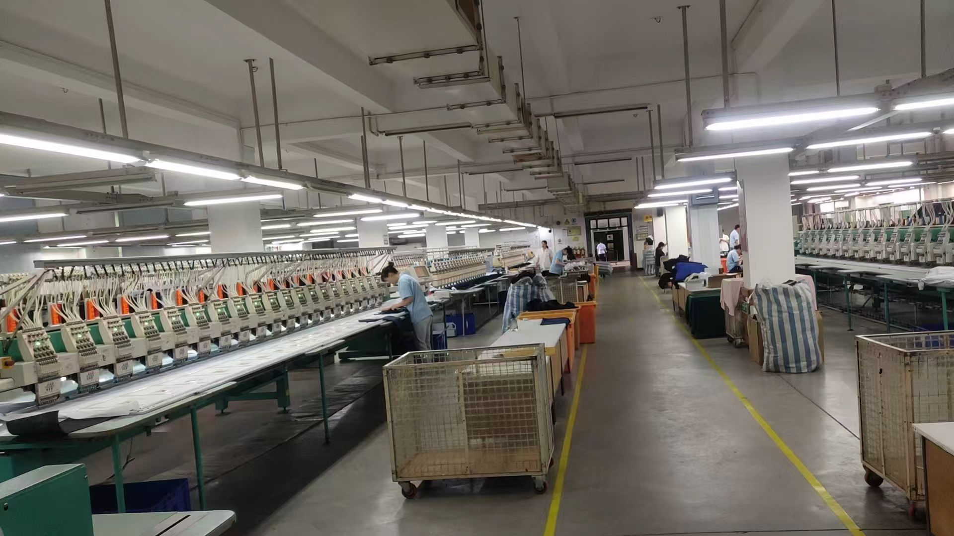 Embroidery machine floor supporting garment decoration work